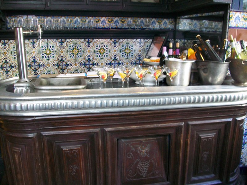 Spain holiday guide community of Madrid-taverna bar with glasses of vermouth